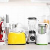 household-kitchen-appliances-on-table-260nw-1104344537